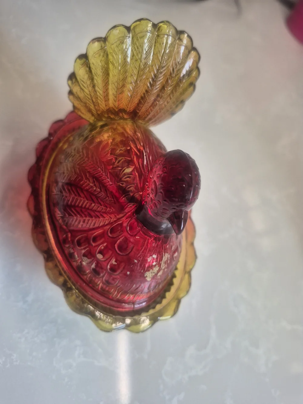 Hen On Basket. Carnival Glass Decorative Dish in Amber to Ruby Iridescent